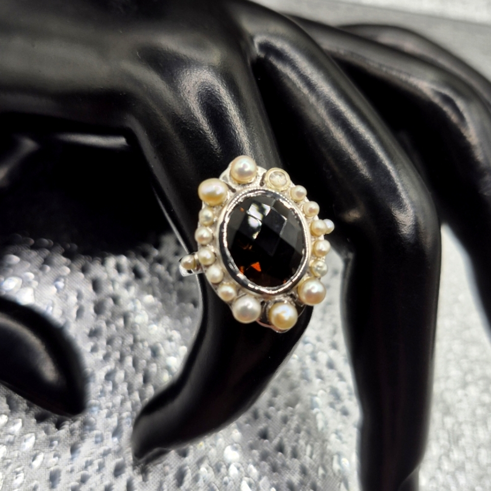 Beautiful Smokey Topaz surrounded by round freshwater Pearls.